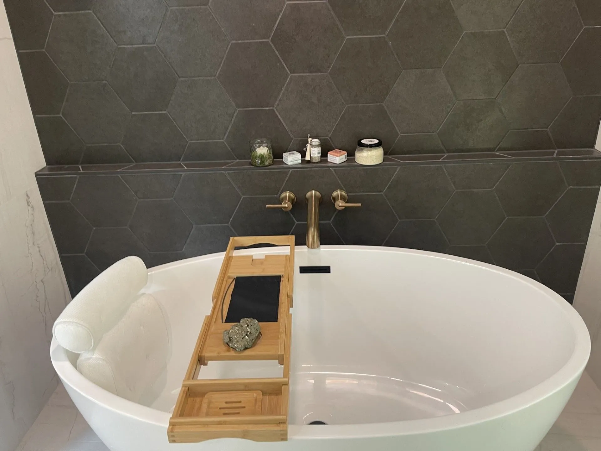 A bath tub with a phone on it